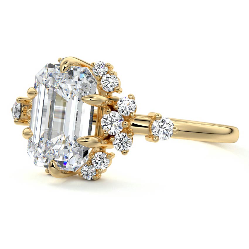 Marina emerald cut floral side stone lab grown diamond engagement ring in yellow gold