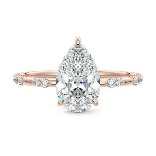 Yasmin pear side stone lab grown diamond engagement ring in rose gold