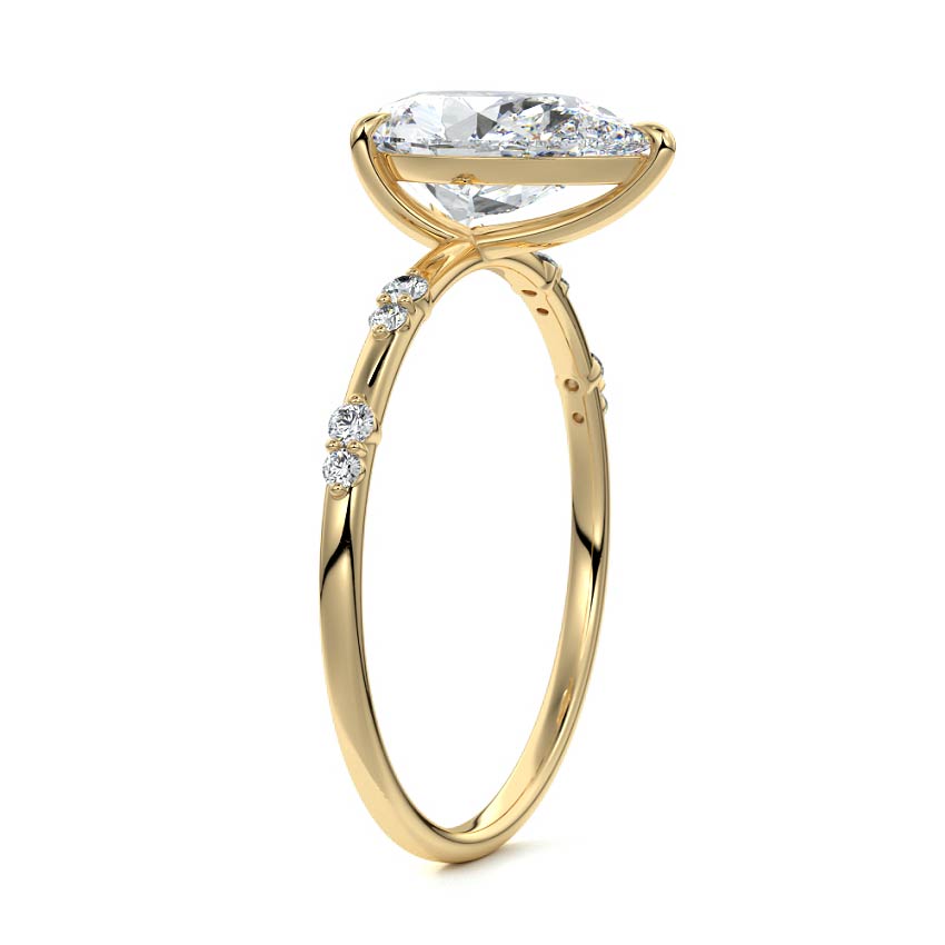 Yasmin pear side stone lab grown diamond engagement ring in yellow gold