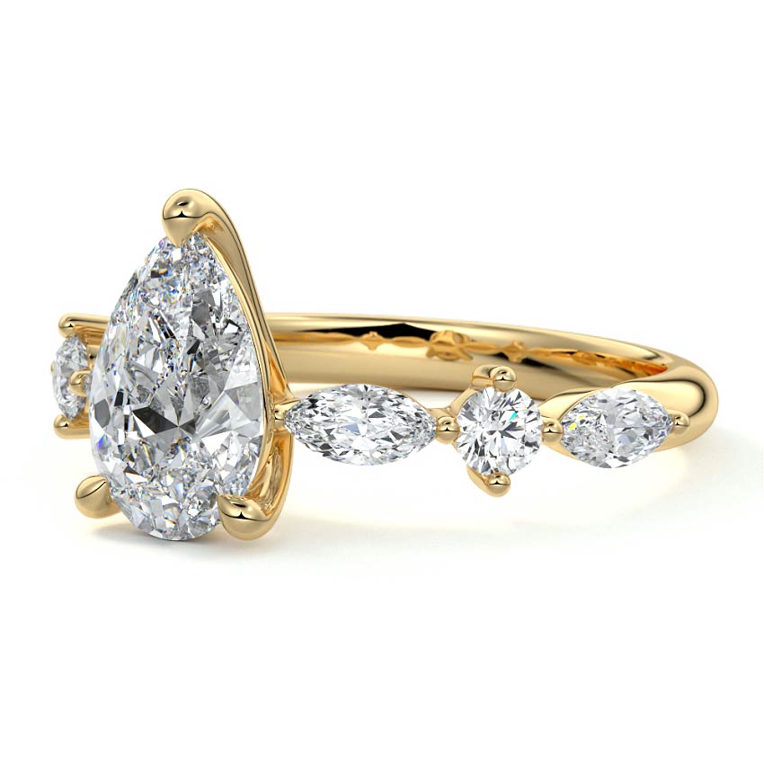 Althea pear side stone lab grown diamond engagement ring in yellow gold