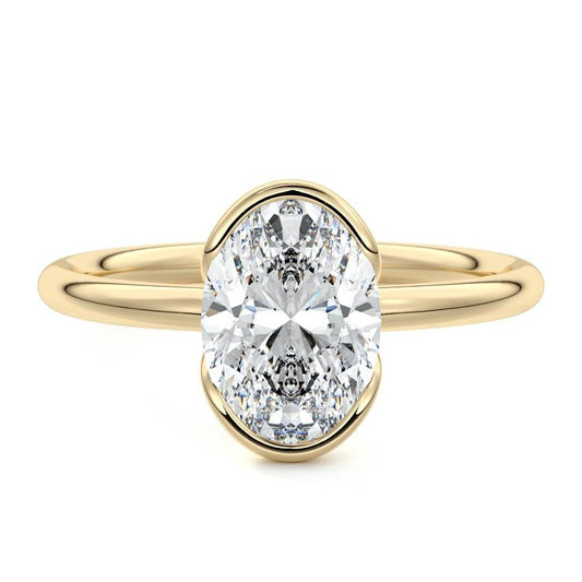 Amira oval bezel solitaire lab grown diamond engagement ring in yellow gold