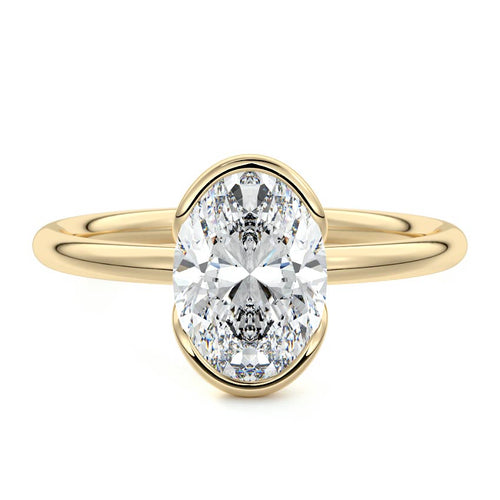 Amira oval bezel solitaire lab grown diamond engagement ring in yellow gold