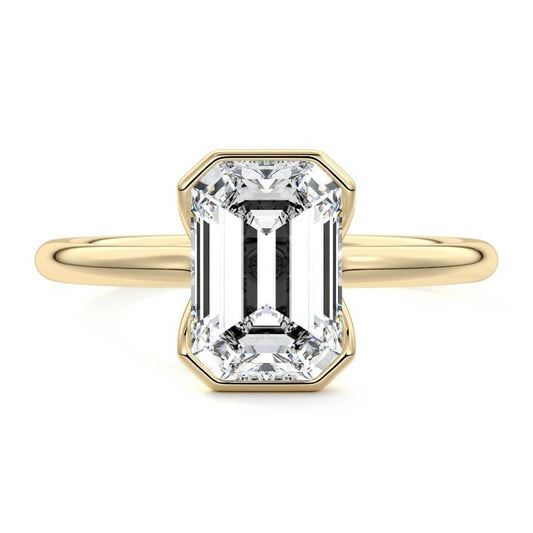 Amira emerald cut bezel solitaire lab grown diamond engagement ring in yellow gold