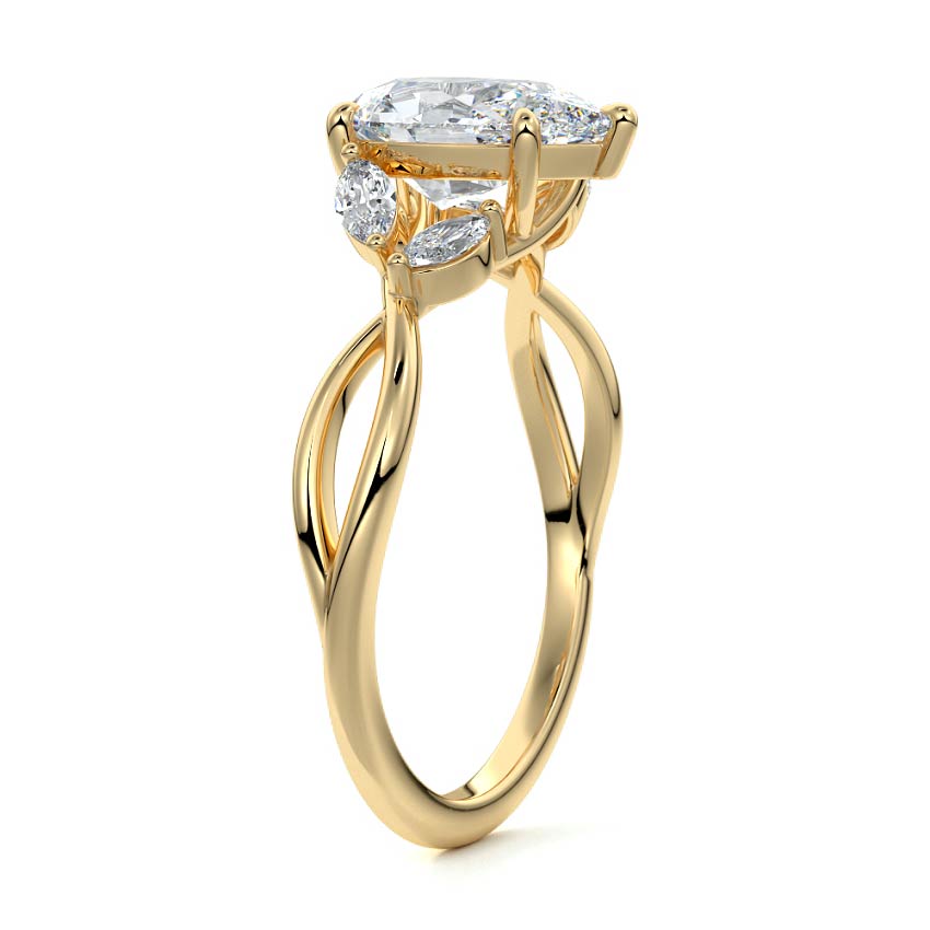 Cassia pear twisted side stone lab grown diamond engagement ring in yellow gold