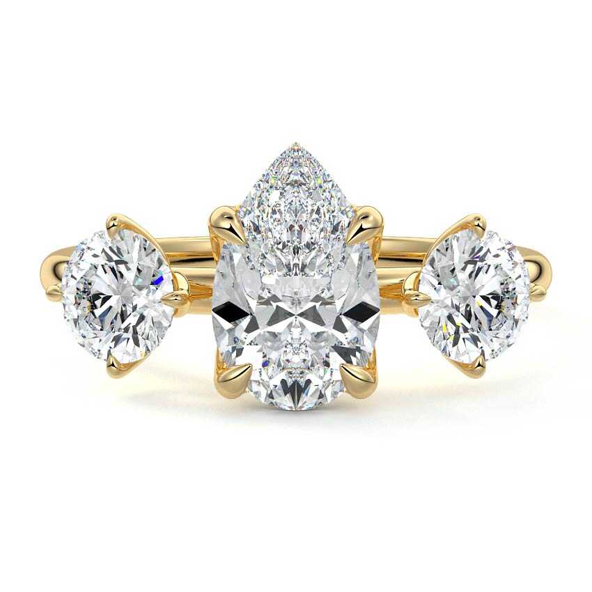 Faye pear three-stone lab grown diamond engagement ring in yellow gold