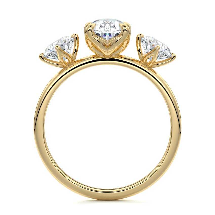 Faye pear three-stone lab grown diamond engagement ring in yellow gold
