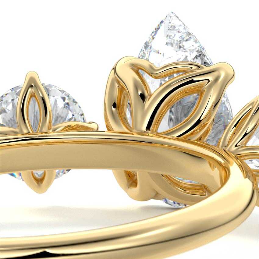 Faye pear three-stone lab grown diamond engagement ring in yellow gold