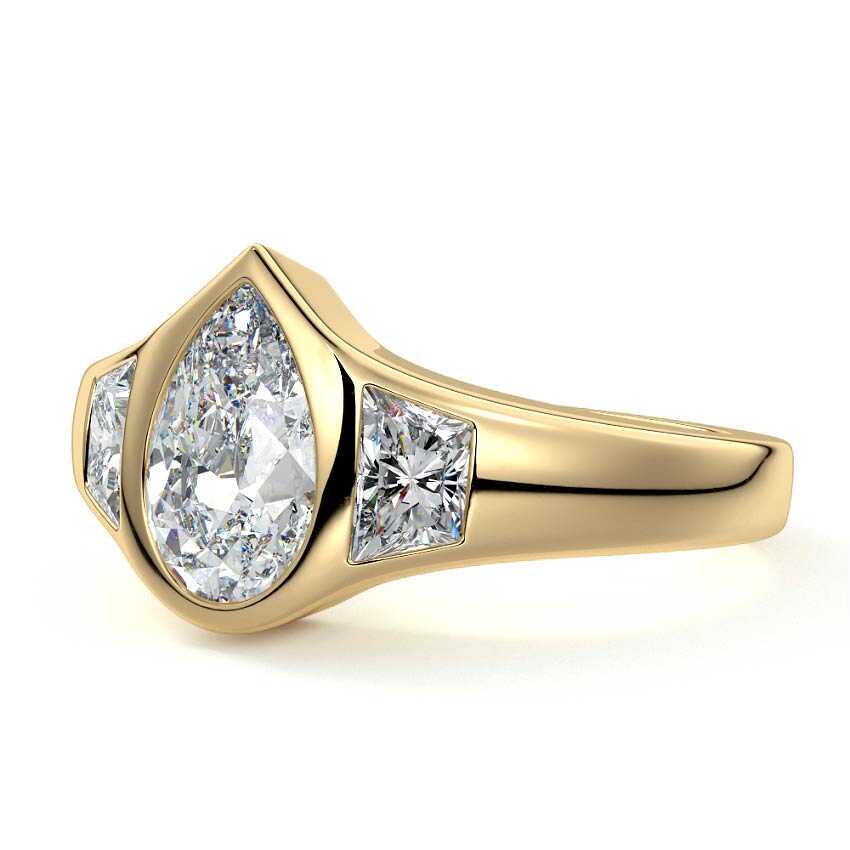 Hana pear bezel three-stone lab grown diamond engagement ring in yellow gold