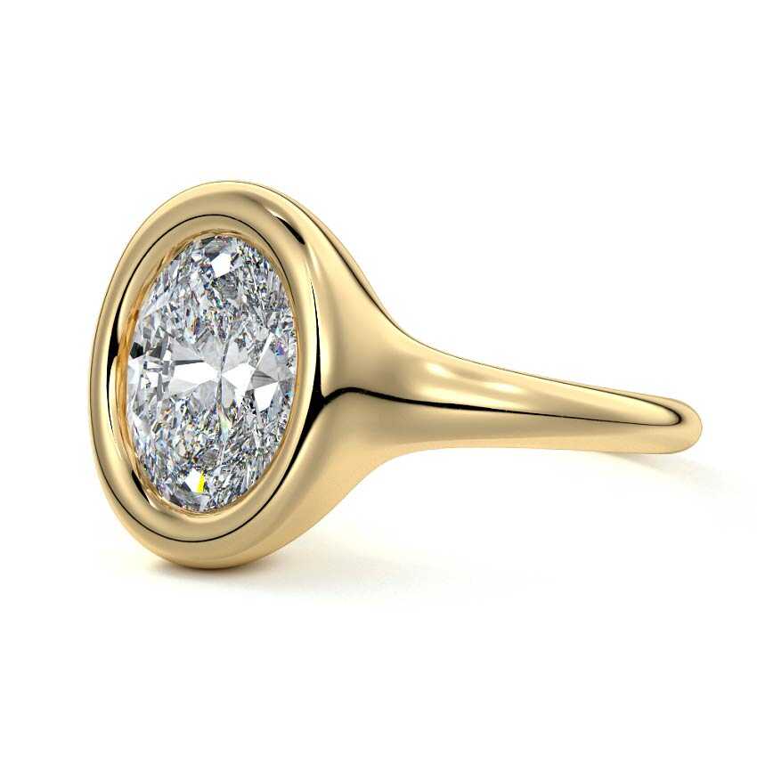 Gianna oval bezel solitaire lab grown diamond engagement ring in yellow gold