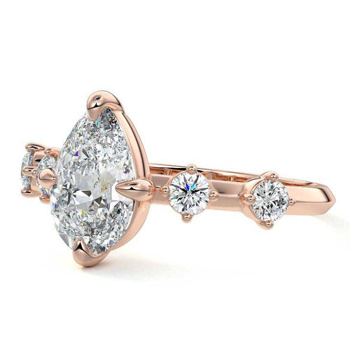 Ilana pear side stone lab grown diamond engagement ring in rose gold