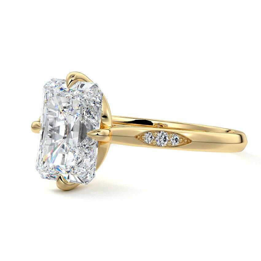 Kaia radiant flush set side stone lab grown diamond engagement ring in yellow gold