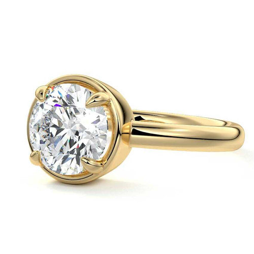 Maelle round bezel solitaire lab grown diamond engagement ring in yellow gold