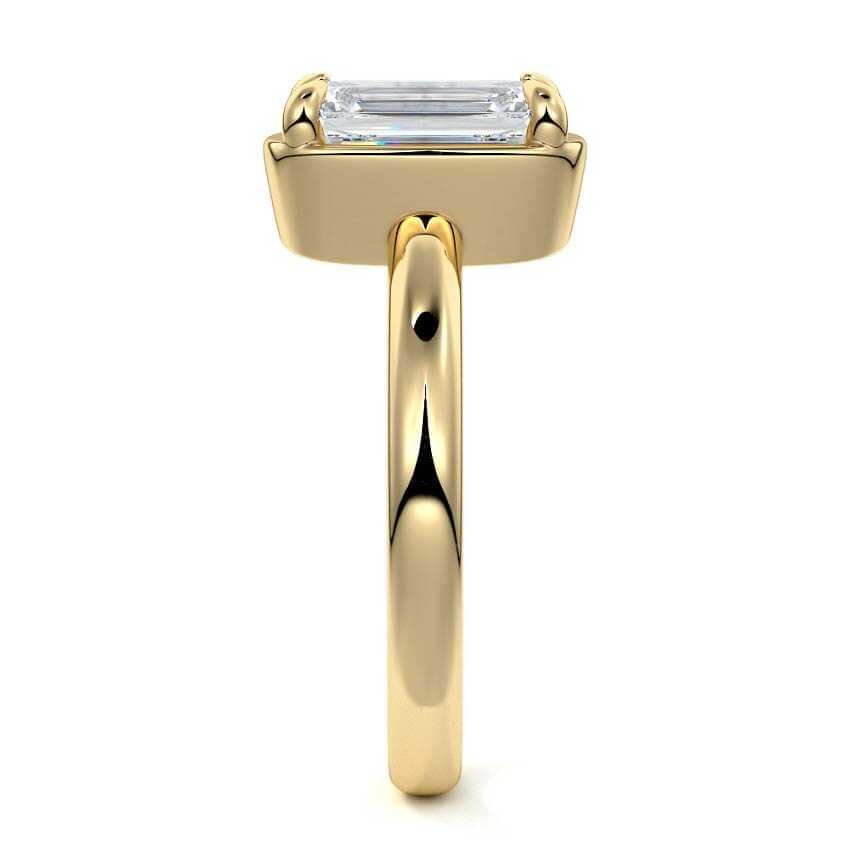 Maelle emerald cut bezel solitaire lab grown diamond engagement ring in yellow gold