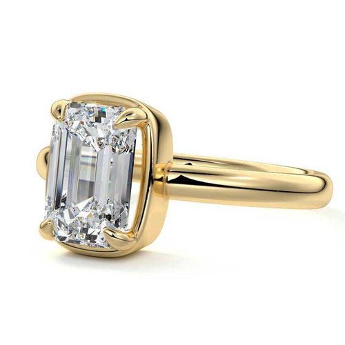 Maelle emerald cut prong set solitaire lab grown diamond engagement ring in yellow gold