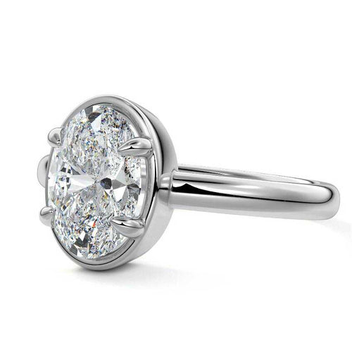 Maelle oval bezel solitaire lab grown diamond engagement ring in platinum