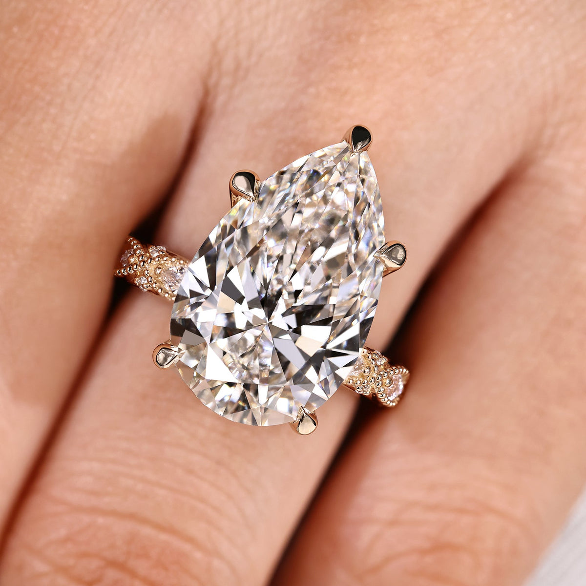 Elodie Grace - 10 Carat Pear Shaped Diamond Ring with Marquise and Round Pave