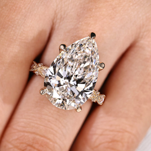 Elodie Grace - 10 Carat Pear Shaped Diamond Ring with Marquise and Round Pave
