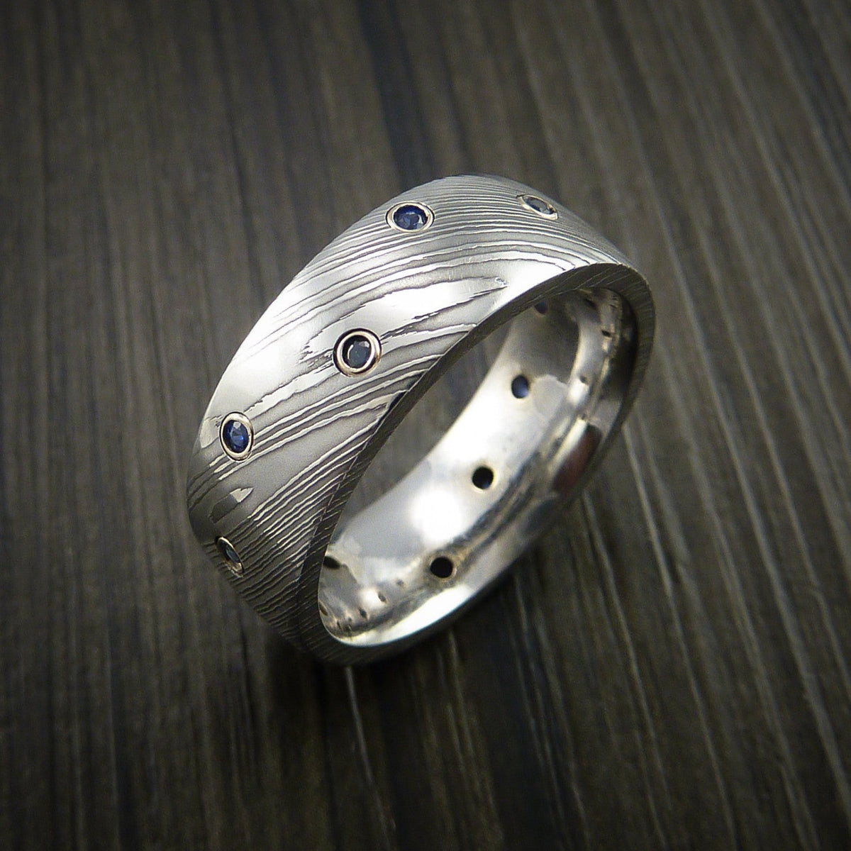 Maverick XI - Damascus Steel Men's Wedding Ring with Bezel Set Blue Sapphires Custom Band - view 4 - Nura Lab