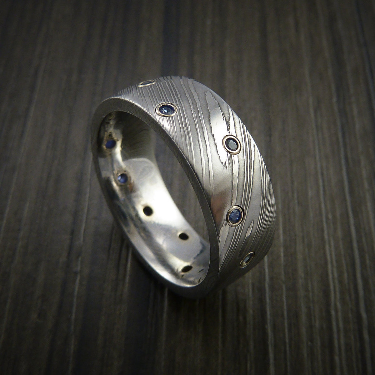 Maverick XI - Damascus Steel Men's Wedding Ring with Bezel Set Blue Sapphires Custom Band - Nura Lab