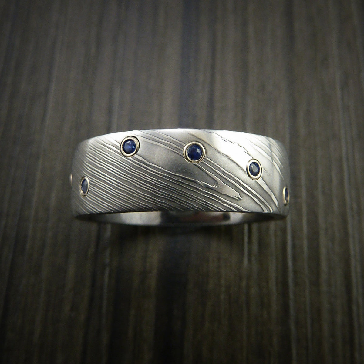 Maverick XI - Damascus Steel Men's Wedding Ring with Bezel Set Blue Sapphires Custom Band - view 2 - Nura Lab