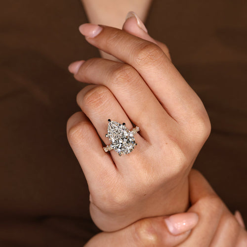 Elodie Grace - 10 Carat Pear Shaped Diamond Ring with Marquise and Round Pave