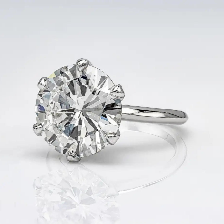 Close-up of solitaire lab-grown engagement ring in platinum