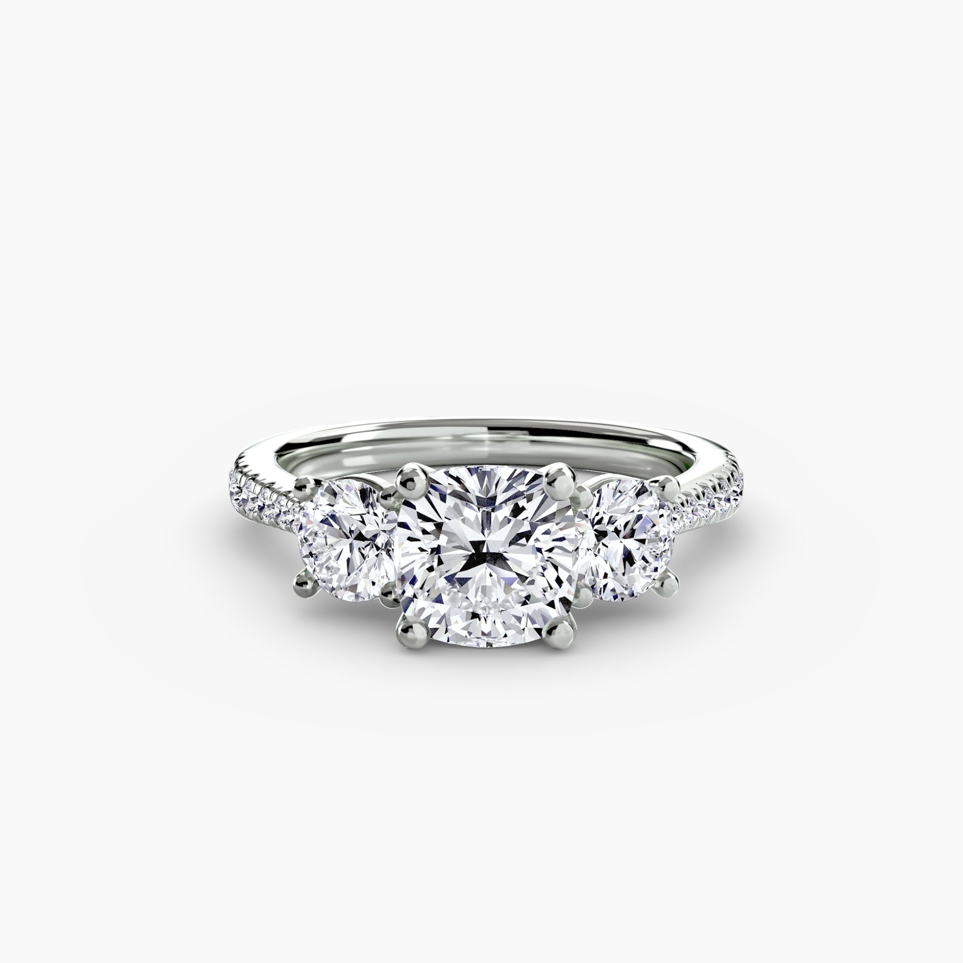 Three-Stone with Pavé Band.