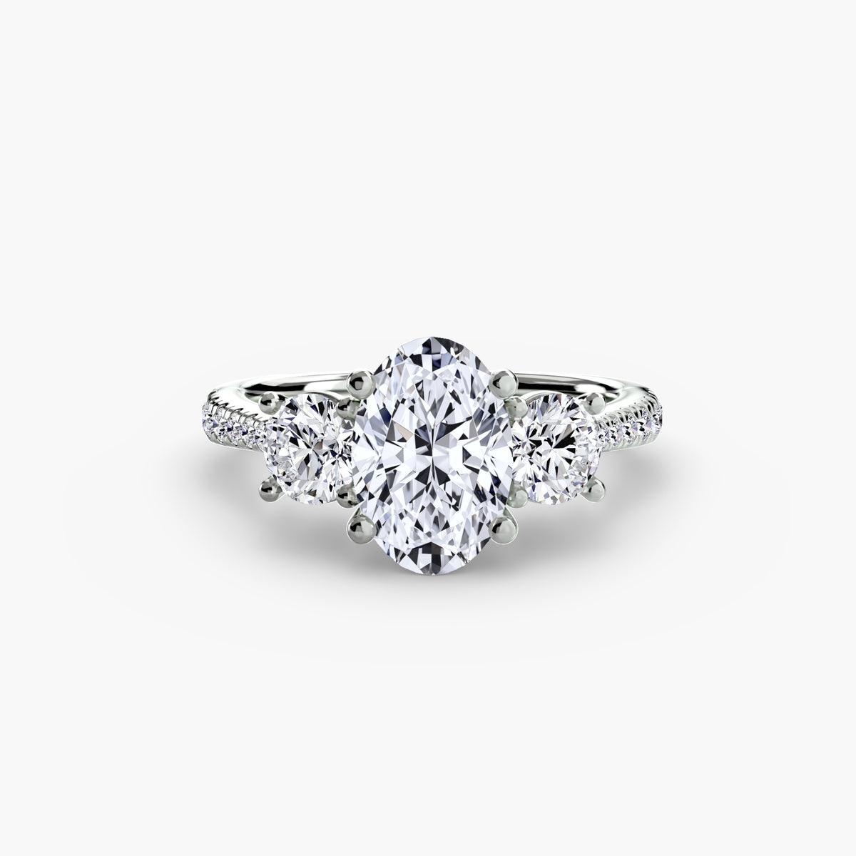 Three-Stone with Pavé Band.