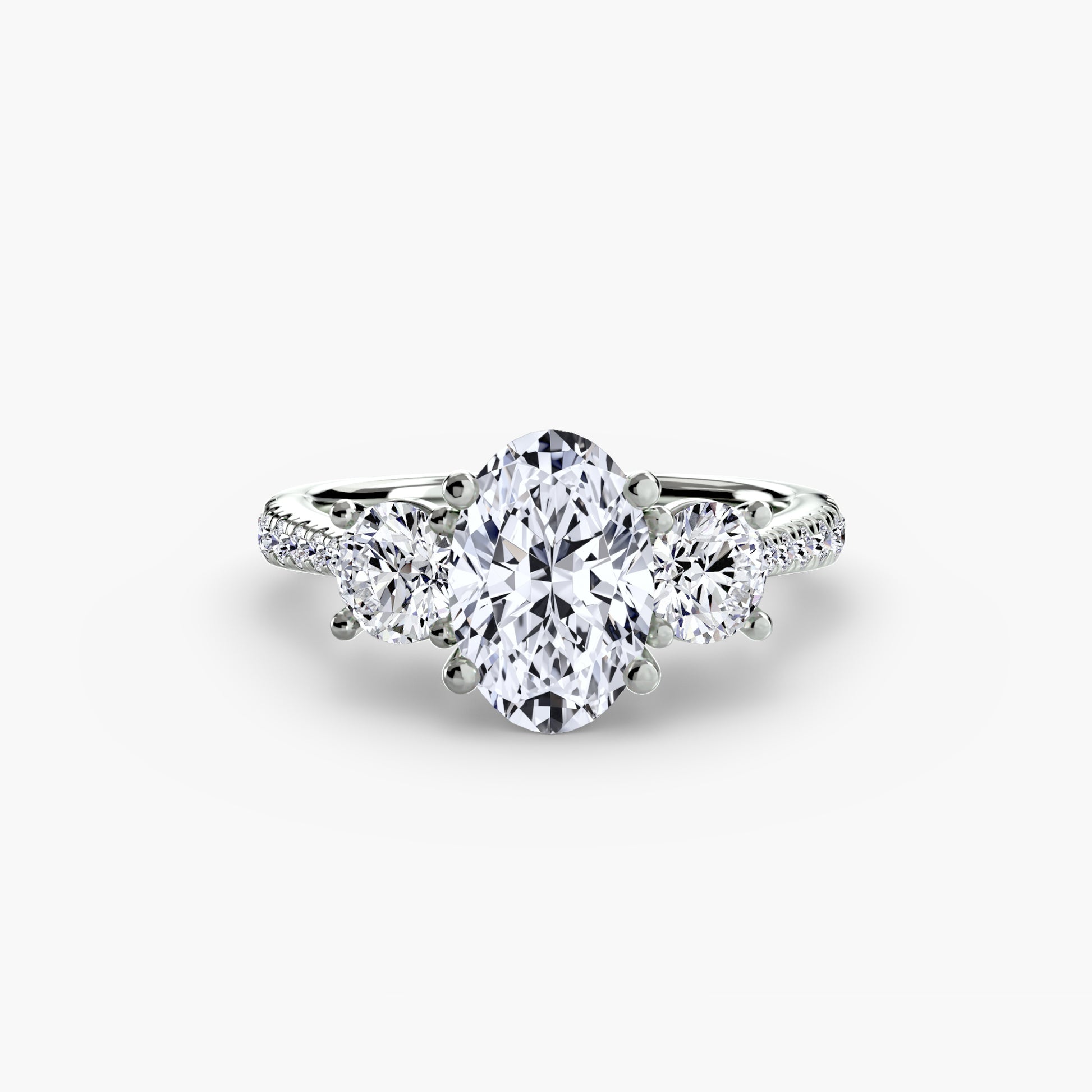 Three-Stone with Pavé Band.