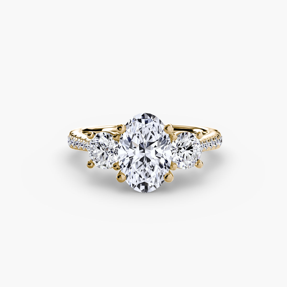 Three-Stone with Pavé Band.