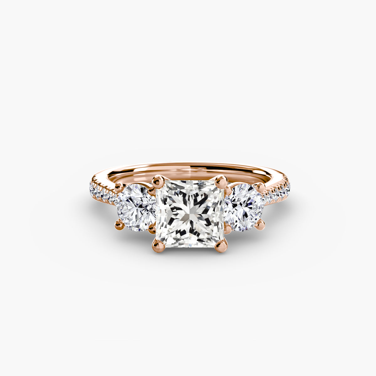 Three-Stone with Pavé Band.