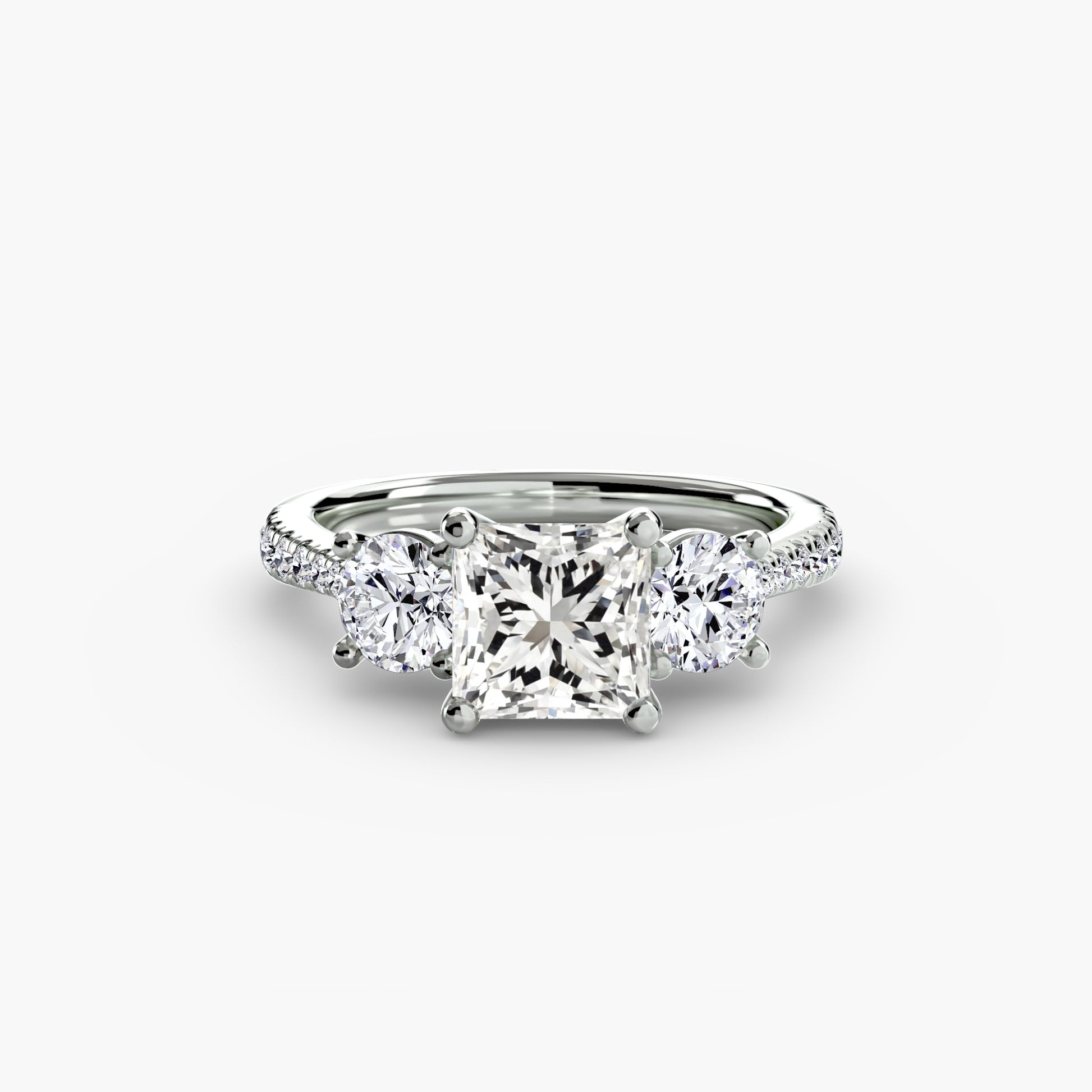 Three-Stone with Pavé Band.