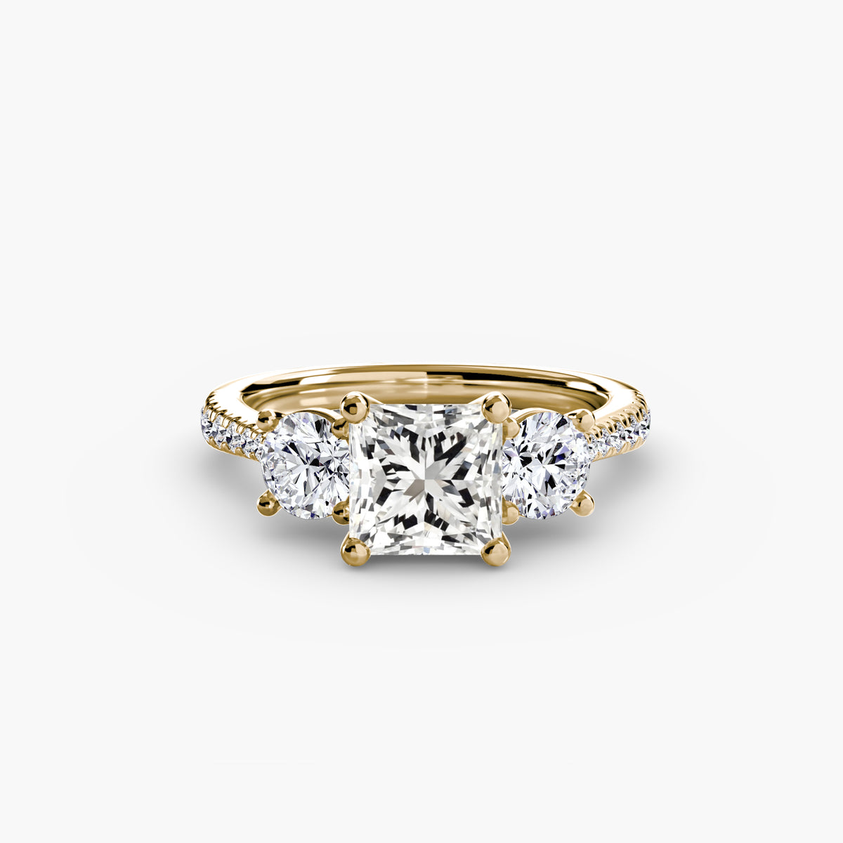 Three-Stone with Pavé Band.