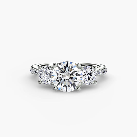 Three-Stone with Pavé Band.