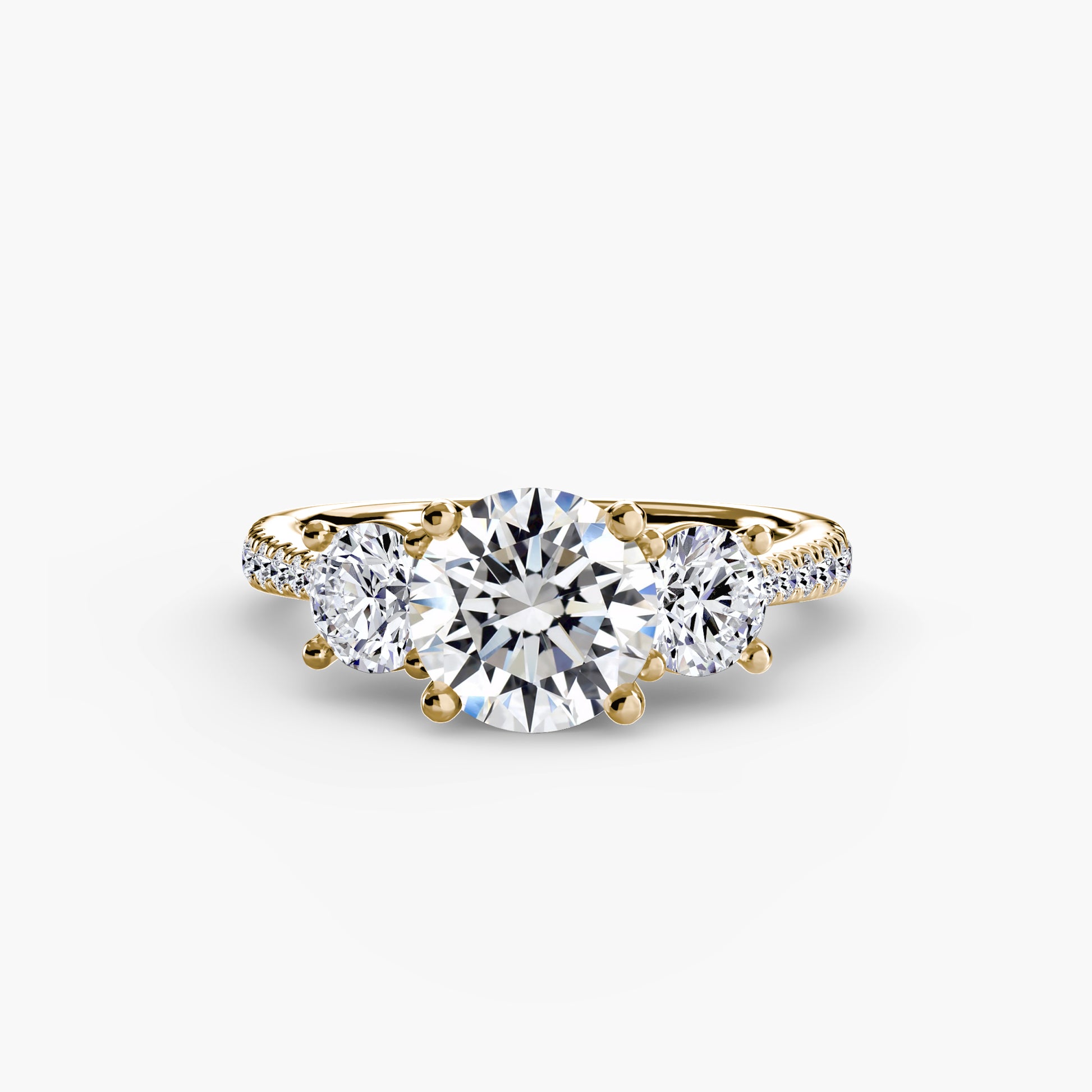 Three-Stone with Pavé Band.