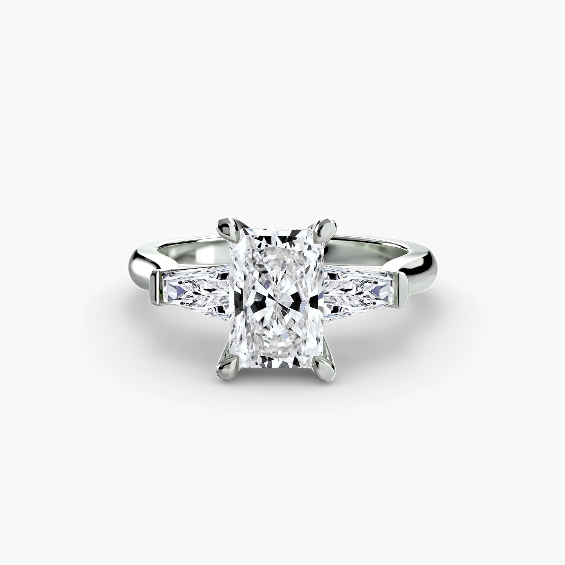 Three-Stone Ring (Baguette Side Stones) 2.