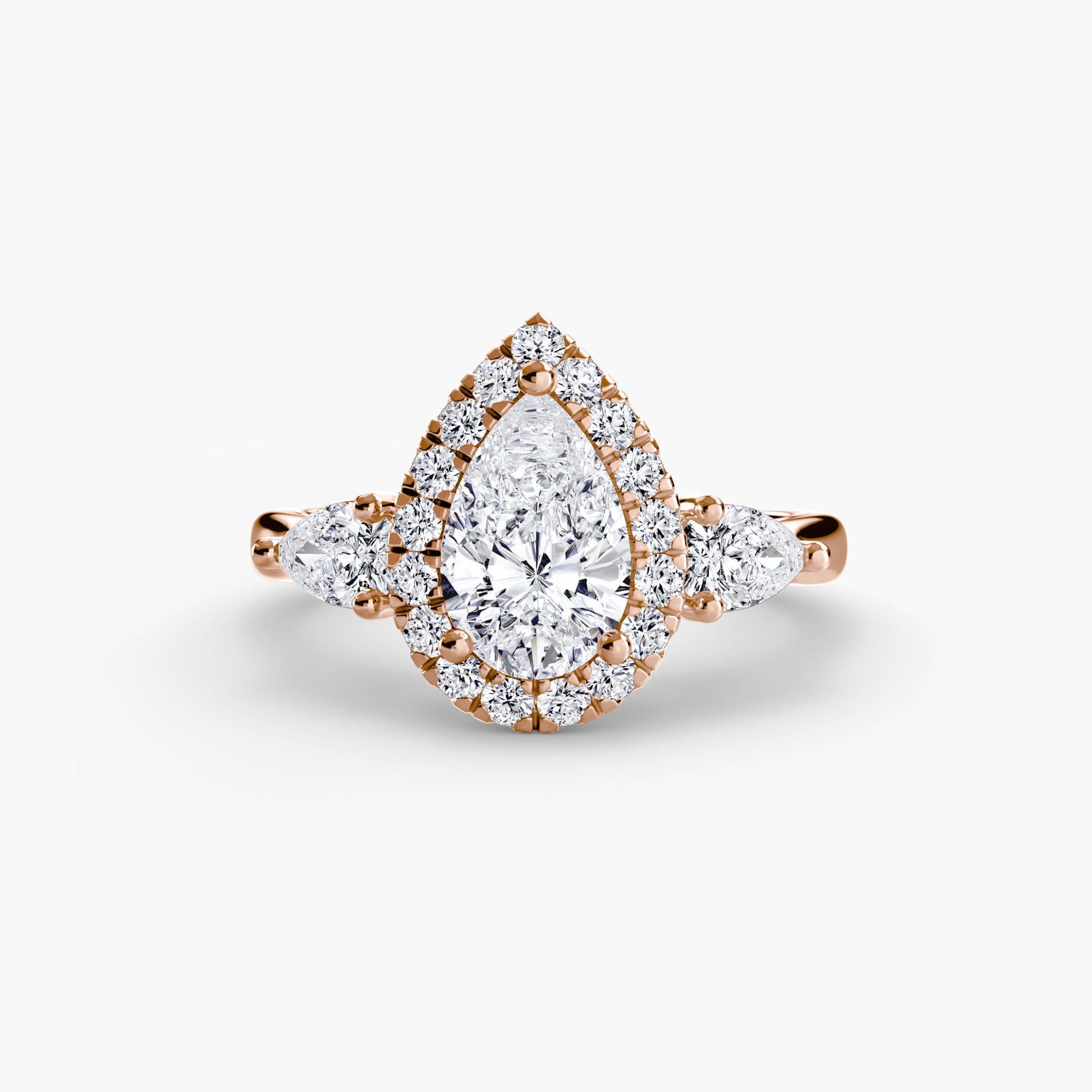 Three-Stone Ring with Halo.
