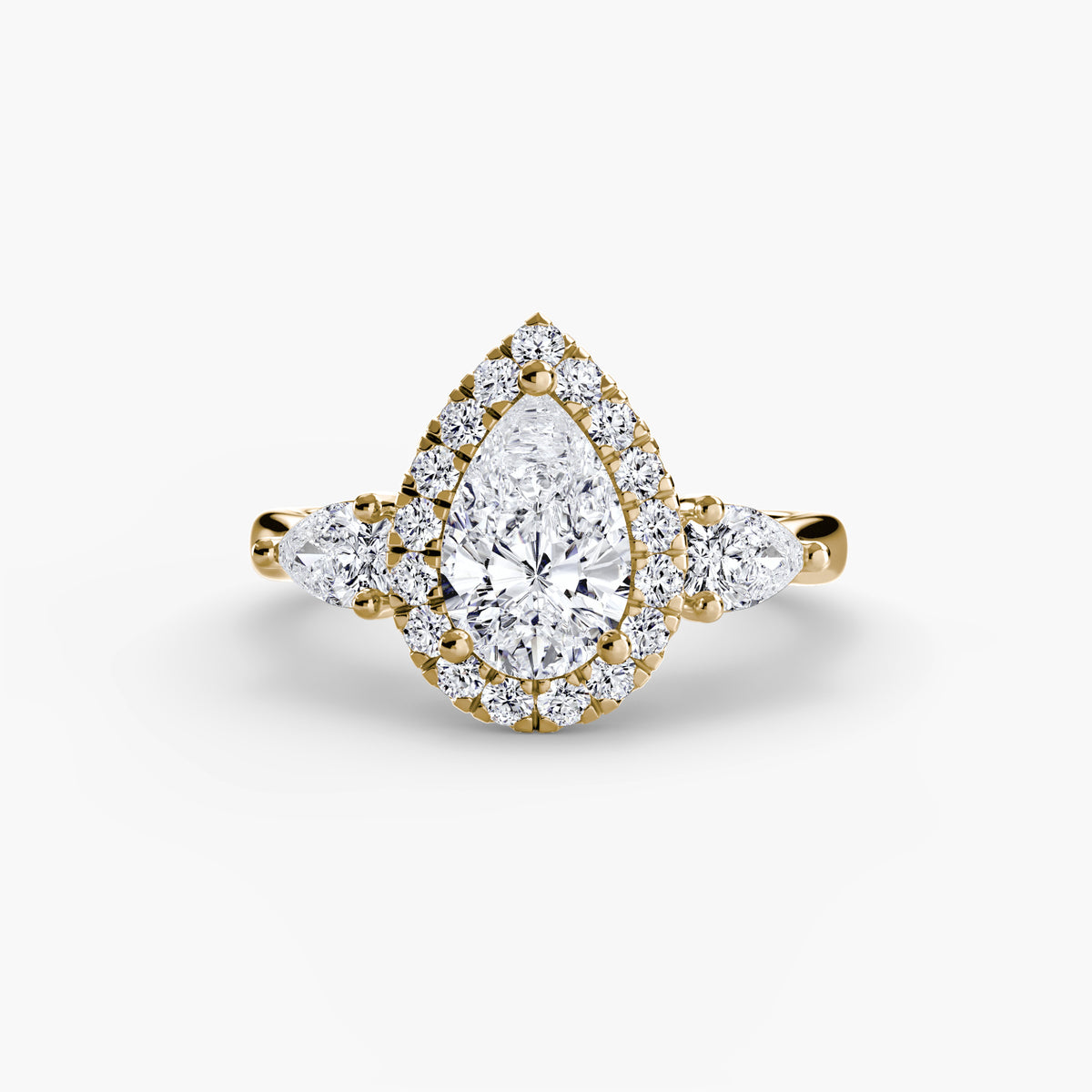 Three-Stone Ring with Halo.