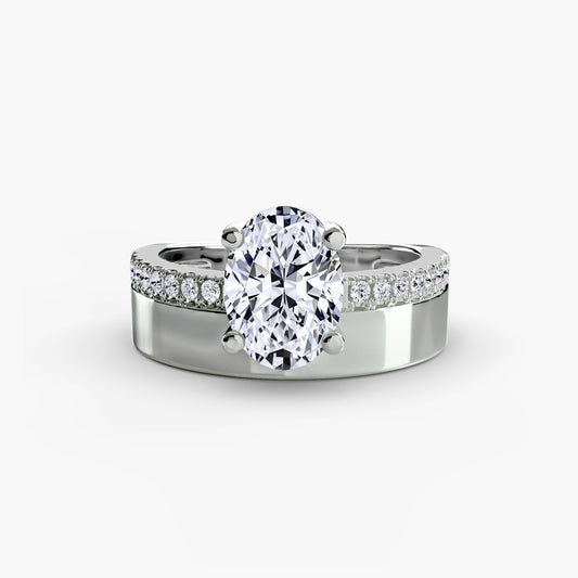 Wide Band Solitaire with Pavé Band.