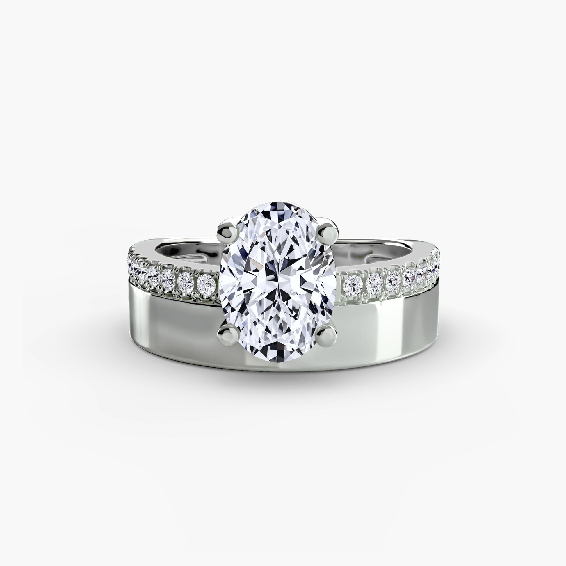 Wide Band Solitaire with Pavé Band.