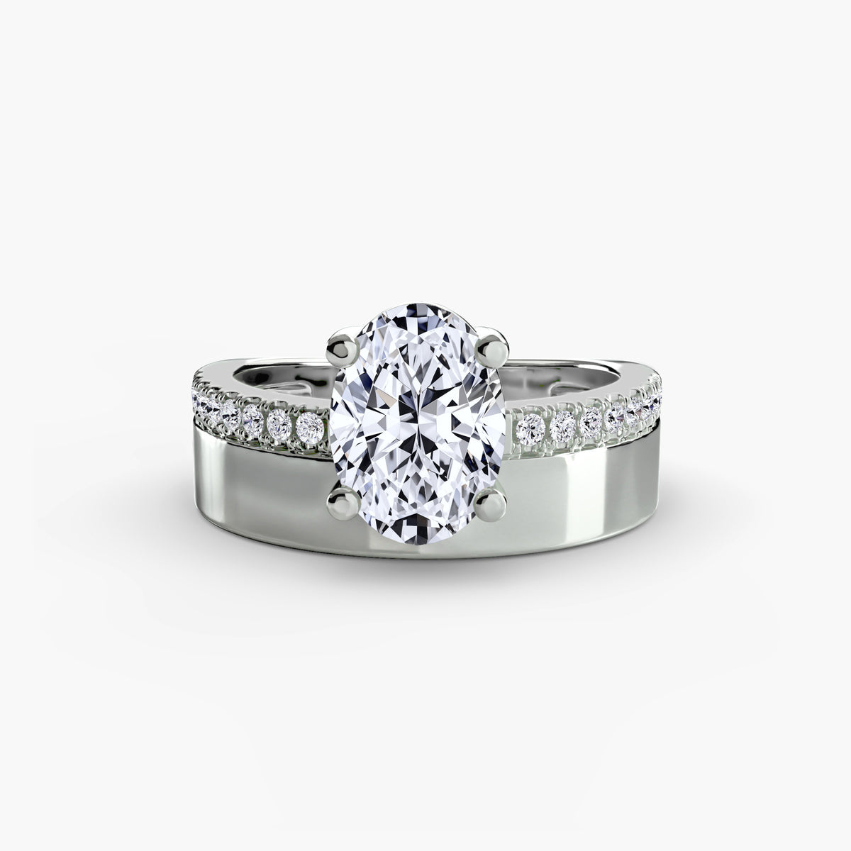 Wide Band Solitaire with Pavé Band.