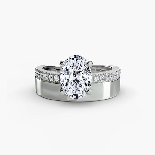 Wide Band Solitaire with Pavé Band.