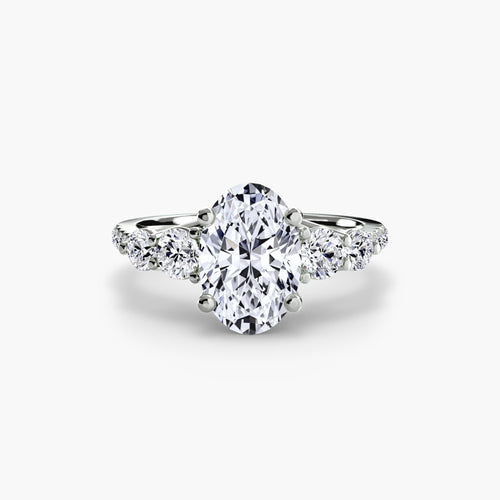 Five Stone Ring with Pavé Band.