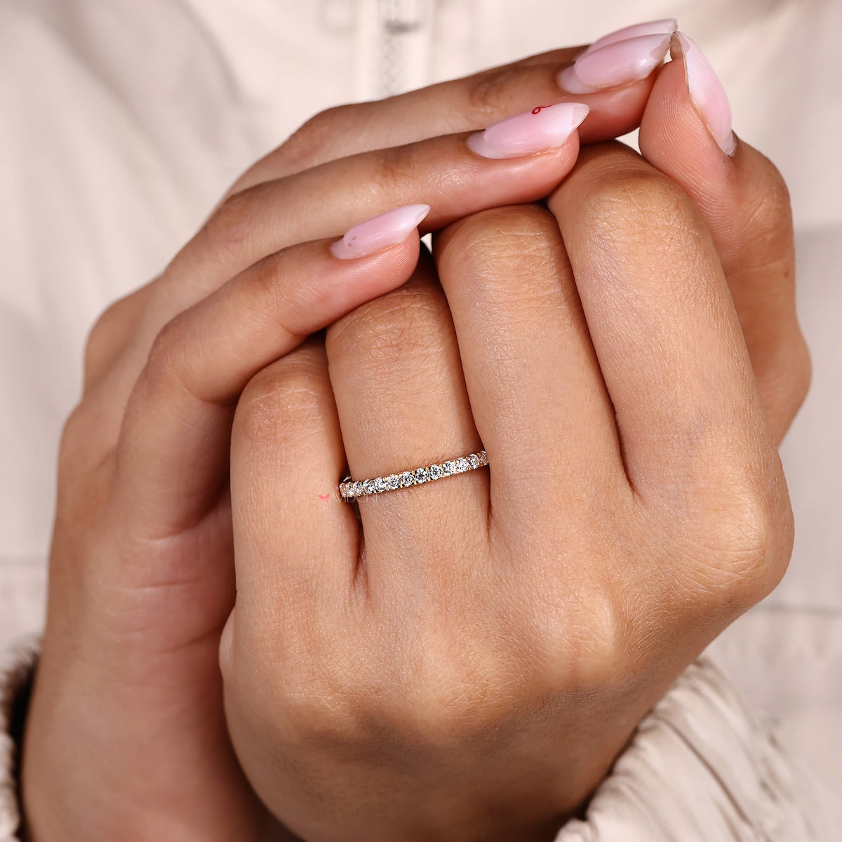 Round wedding band highlights symmetry and clean design in every detail.