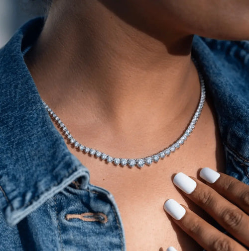 Lab-grown diamond Riviera necklace in 14K white gold styled on model’s neckline