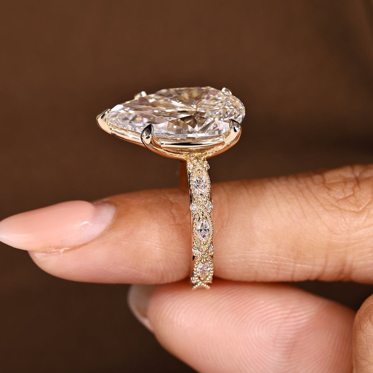 Elodie Grace - 10 Carat Pear Shaped Diamond Ring with Marquise and Round Pave