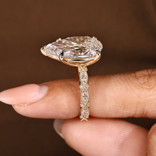 Elodie Grace - 10 Carat Pear Shaped Diamond Ring with Marquise and Round Pave