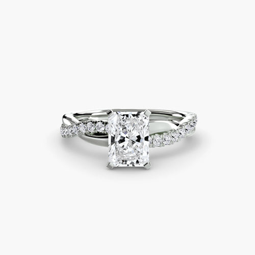 The Emerald Twist Pavé Ring.