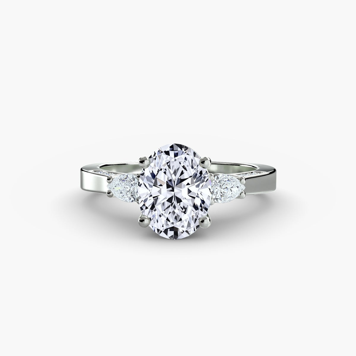 Three Stone with Pavé Shoulders.