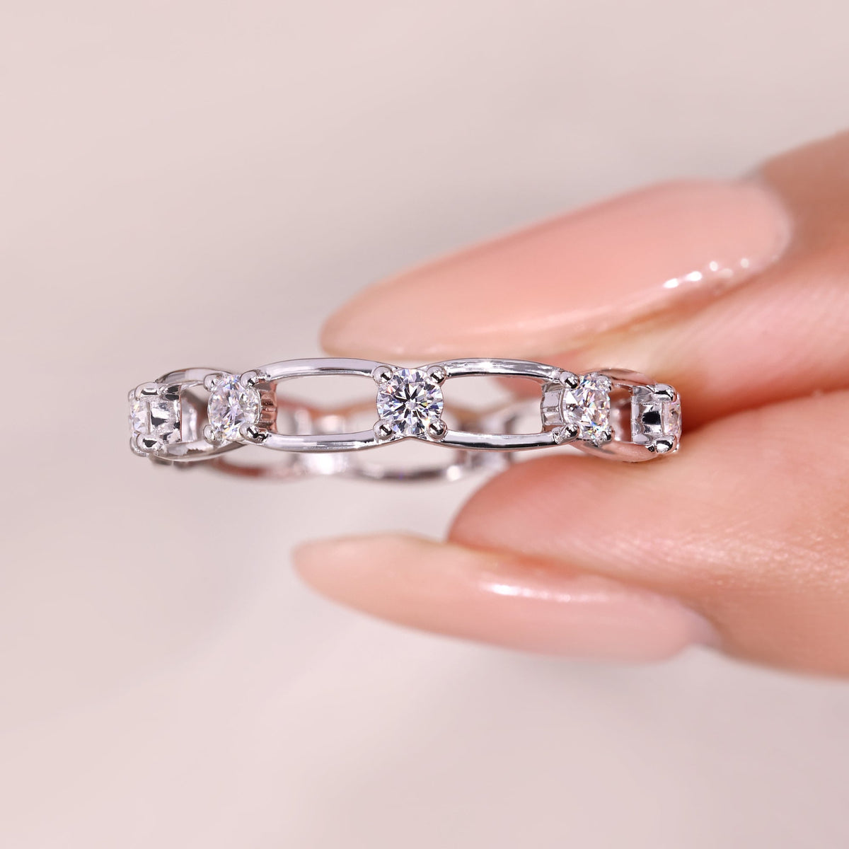Avideri round moissanite eternity band.
